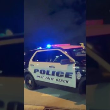 Cop Smiles For The Camera?