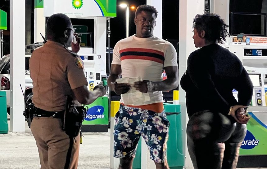 State Trooper Pulls Driver Out Of Car