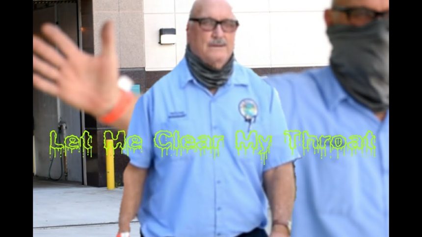 Male Karen County Worker Coughs On Photographer